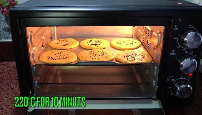 Bake in a preheated oven at 220°C (428°F) for 10-12 minutes, or until golden brown (262.919-294.639).