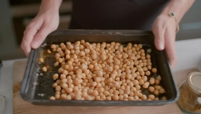 Roast chickpeas: Bake for 15-20 minutes at preheated oven temperature until golden and crispy.