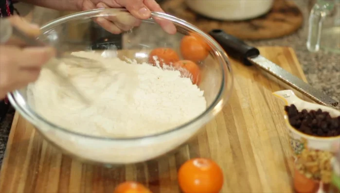 Whisk together the dry ingredients: flour, cardamom, salt, and baking powder.