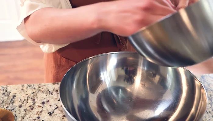 Combine doughs: Put the Biga and the second dough in a large bowl. Mix and knead.
