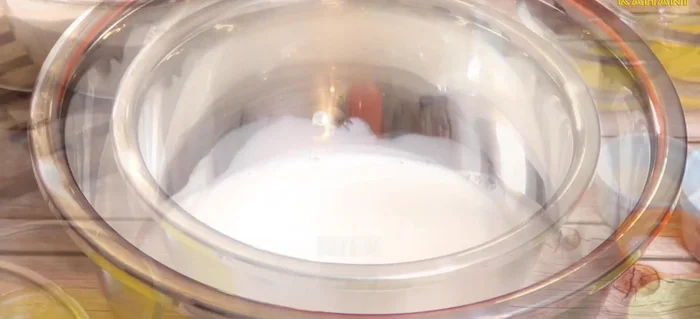 In a bowl, add one cup of milk and one teaspoon of flour, mix well.