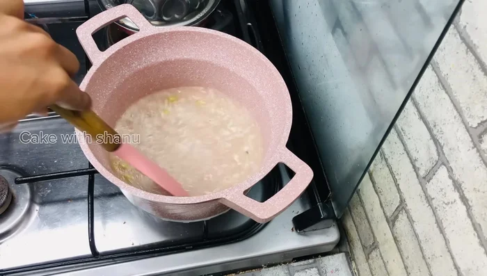 Remove the fried luqaimat and let them drain on paper towels.