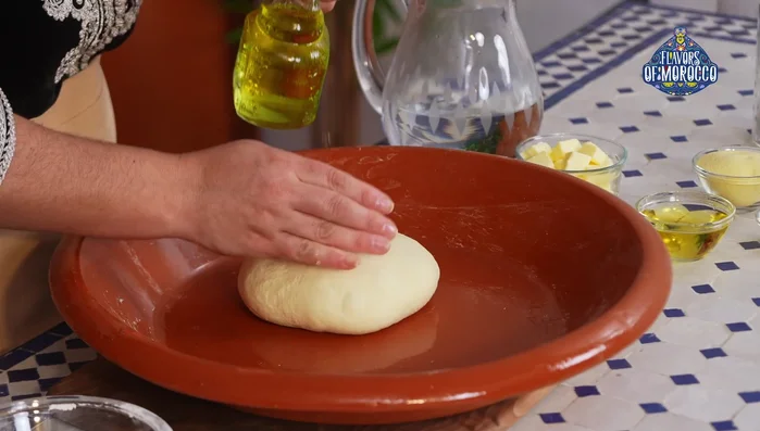 Let the dough rest: Bring the dough together, coat it with oil to prevent sticking, and let it rest for at least 10 minutes. The longer it rests, the easier it will be to fold.