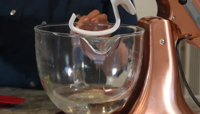 Add yeast to water and let it sit for five minutes.