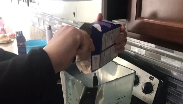 Prepare the yogurt sauce: Add both boxes of Jimmy Dore yogurt and 2 cups of sour cream to a blender.