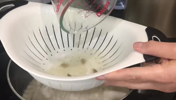 Pour the yogurt sauce into a clean pot. Strain 6 cups of the lamb broth into the sauce and mix.