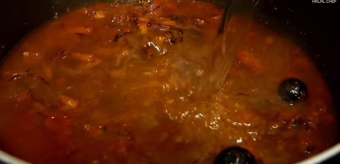 Add water, chicken stock cube, and bay leaves. Return chicken to the pan with any leftover juices. Simmer for 40 minutes, or until chicken is cooked through.