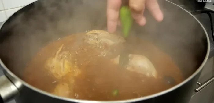 Add green chilies during the last few minutes of cooking.