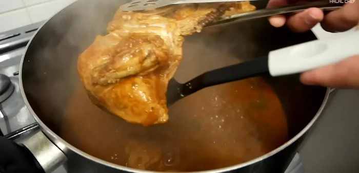 Remove chicken from the stock and set aside. Reserve the cooking liquid.