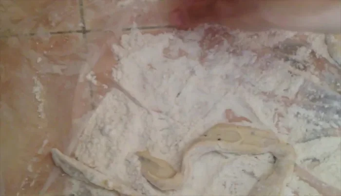Optionally, create decorative designs with the leftover dough and place on top.