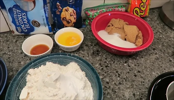 Beat butter, brown sugar, granulated sugar, and vanilla in a mixer until creamy.