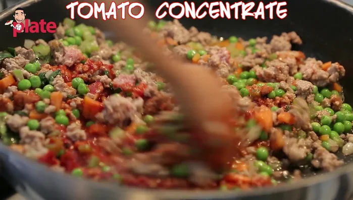 Stir in tomato paste, mix well. The concentrate will give it a nice red color and flavour. Add salt and simmer for 10 minutes (129.2).