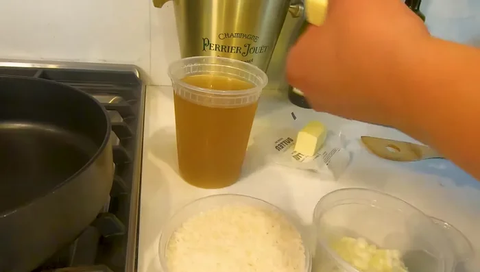 Melt half a stick of butter in a pot over medium heat.