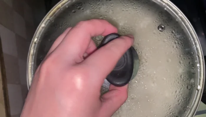 Once the water starts drying, put the rice on high heat.
