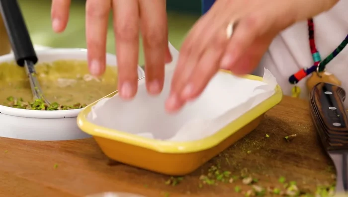 Pour into a prepared baking sheet lined with baking paper and let it cool.