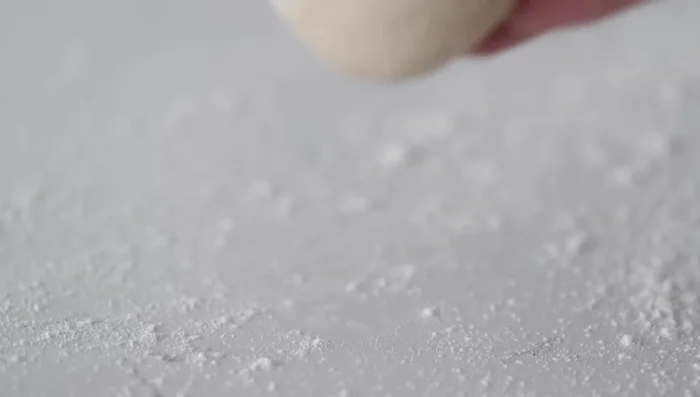 Roll out: Lightly flour a surface. Roll each ball into a thin (1/8 inch) circle. Cover with a towel and let rest for 30 minutes. (330.54)