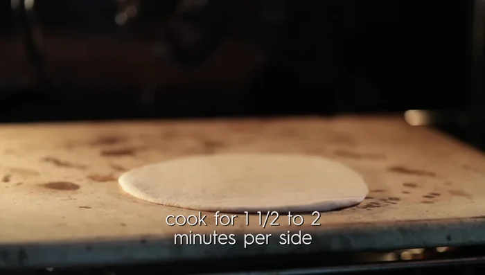 Bake (Oven Method): Preheat oven to 550°F (or 500°F) with a pizza stone inside. Place pita breads on the hot stone and bake for 2 minutes per side, or until puffed and lightly browned. (386)