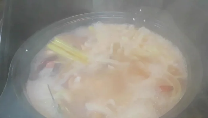 Bring to a boil, then simmer: Bring the mixture to a boil, reduce heat, cover, and simmer for 25-30 minutes.