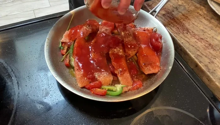 Add crushed tomatoes and a little bit of water.