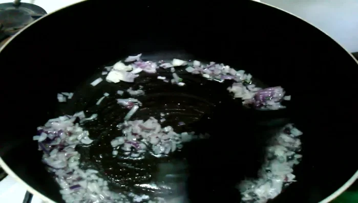 Heat 2 tablespoons of vegetable oil in a pan. Add chopped onions and cook for 5 minutes.