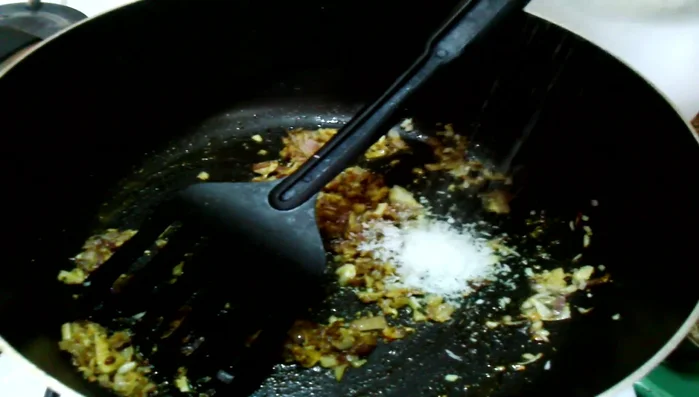 Add desiccated coconut and cook for 2 minutes.