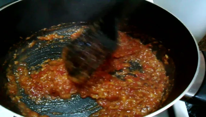 Cover tomatoes and cook for 3 minutes to cook the choosy mix.