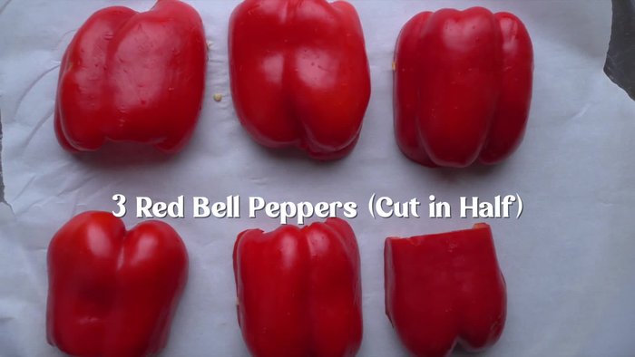 Cover the roasted peppers with cling wrap for 10 minutes.