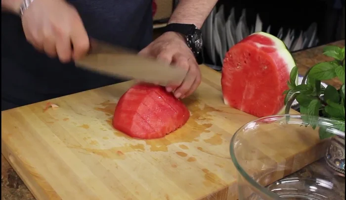 Cut the watermelon into half-inch thick slices, aiming for consistent size.