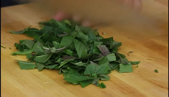 Combine the diced watermelon, feta cheese, and chopped mint in a bowl.