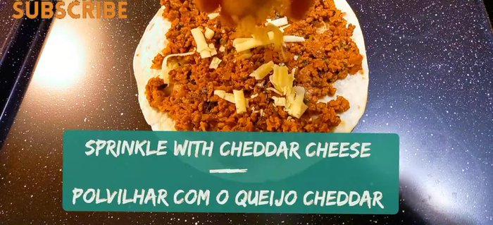 Sprinkle with cheddar cheese.
