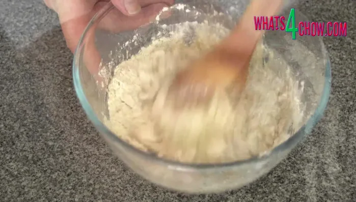 Turn the dough onto a lightly floured surface and knead for two minutes until smooth.