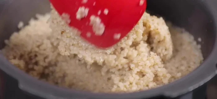 Once the millets are cooked (no water left, and they look dry and plump), remove them from the pressure cooker and let them cool completely.