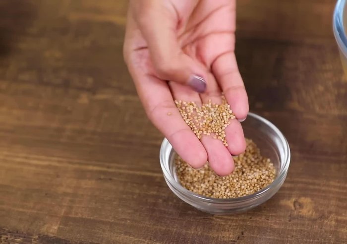 Soak coro millets for at least 6 hours. Wash them twice to remove excess color.